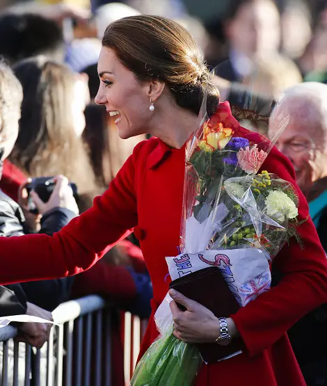 The Duchess of Cambridge in Red Carolina Herrera coat for Yukon Day