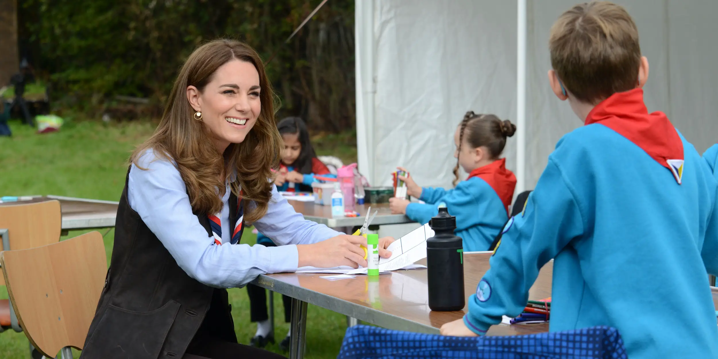 The Duchess of Cambridge wore Massimo Dutti Sky Blue Plain 100% Linen Shirt in September 2020 to visit scouts