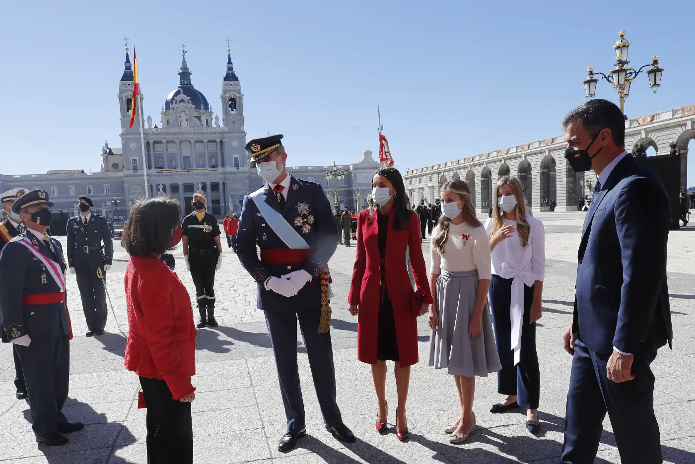 Queen Letizia in red Felipe Varela Japanese Twin Ties Coat  for the Natioanl day event
