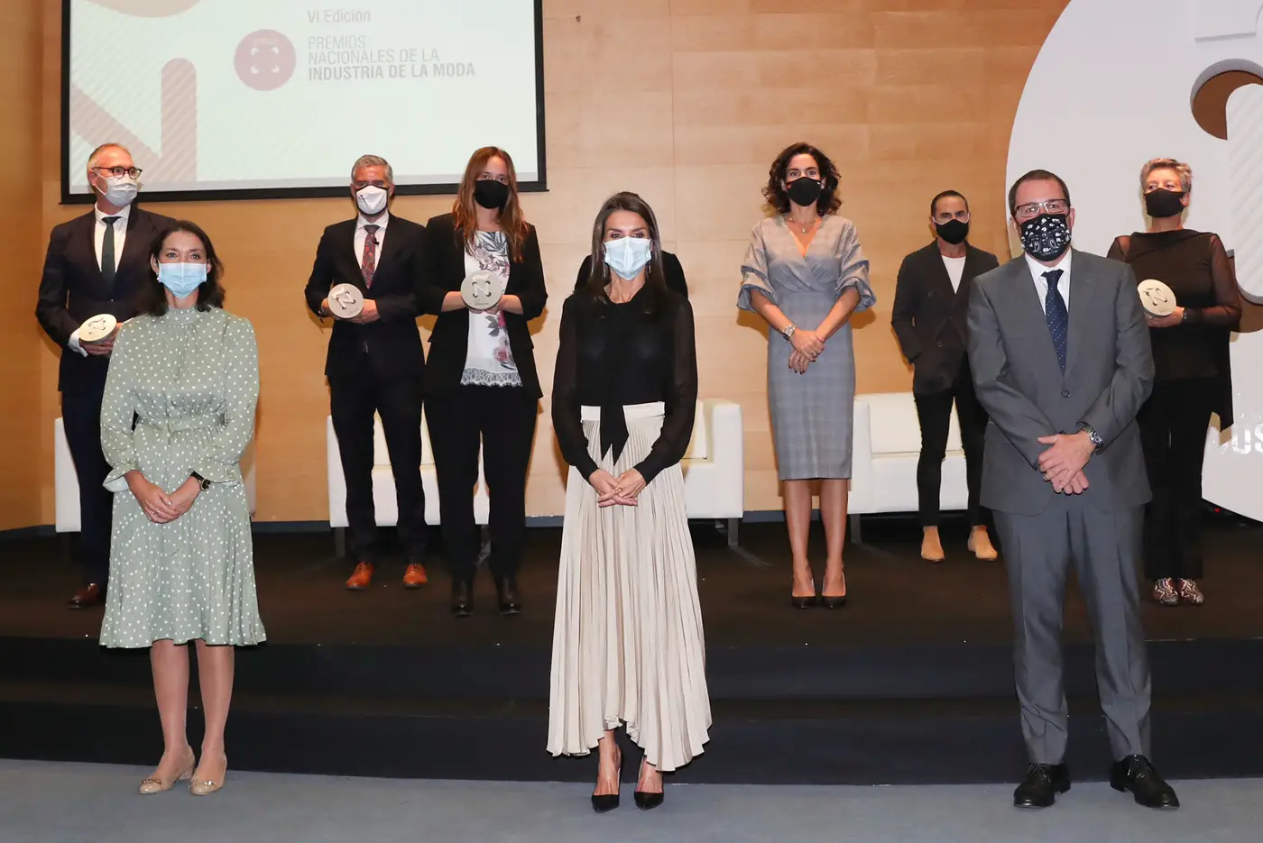 Queen Letizia of Spain in Carolina Herrera coat and Massimo Dutti skirt for National Fashion Awards 2020