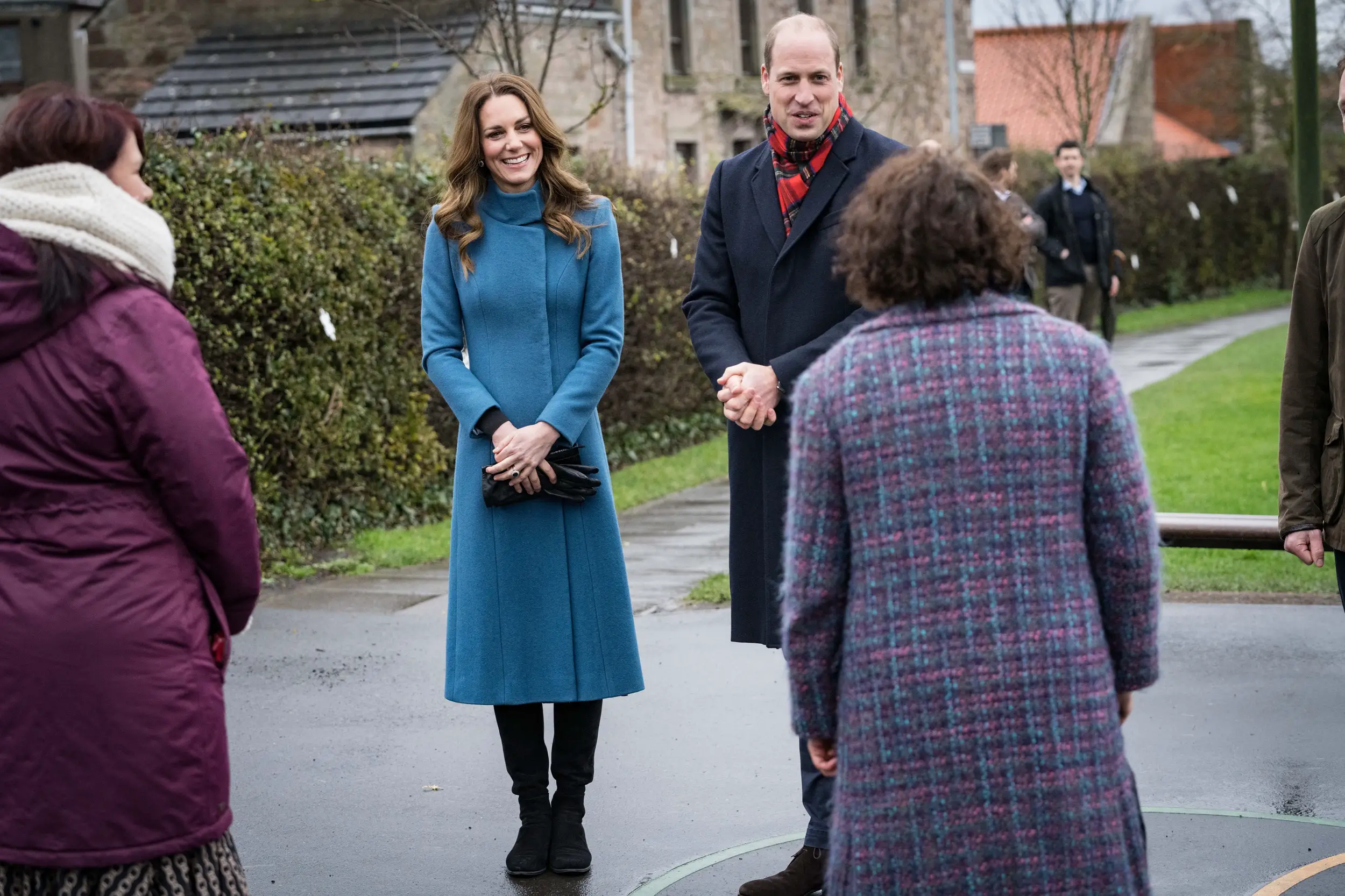 The Duchess of Cambridge wore Catherine Walker teal blue high-neck coat on the Day 2 of Royal Train tour in Edinbrugh