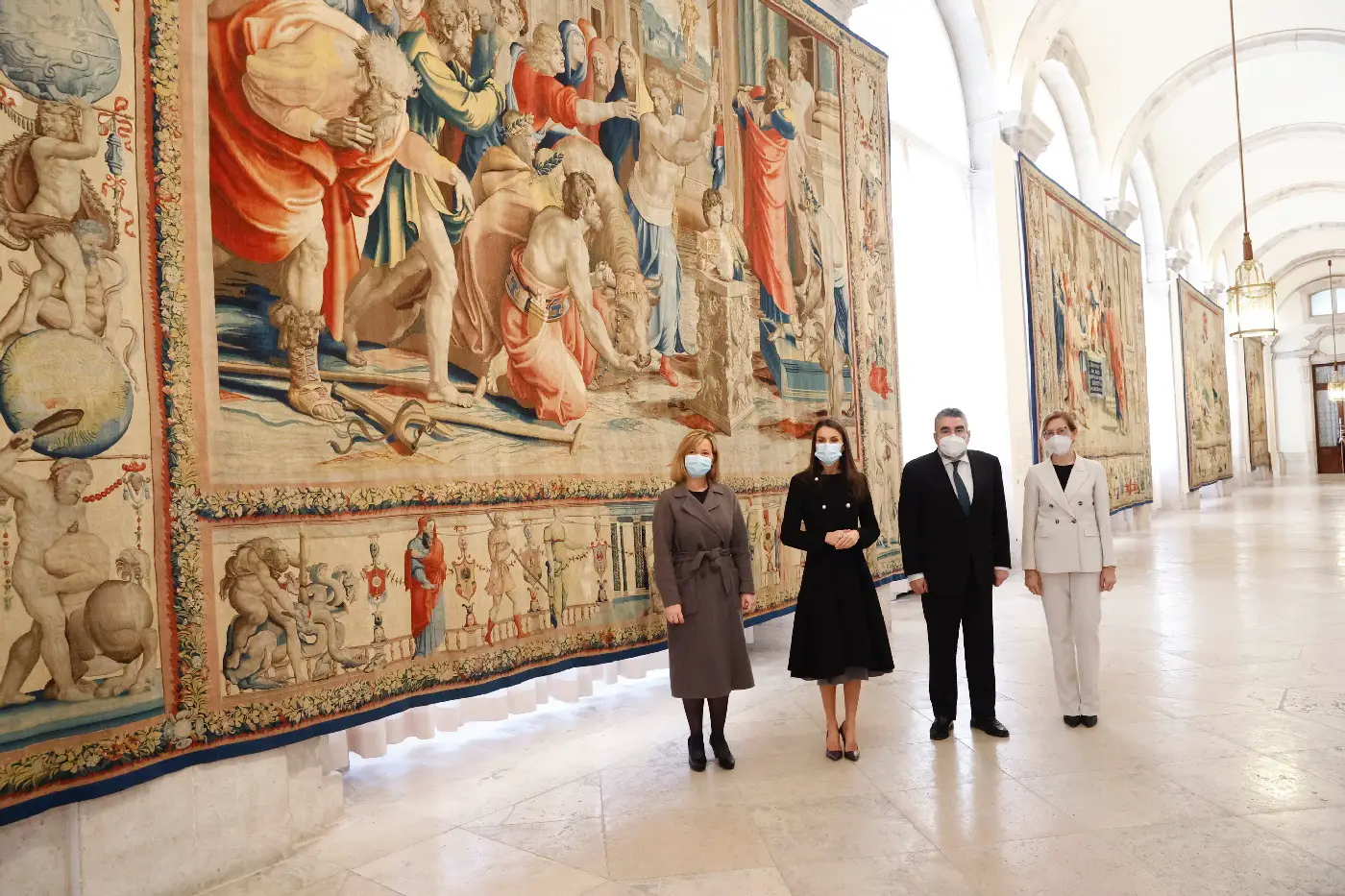 Queen Letizia of Spain chose black Carolina Herrera coat with grey dress for the inauguration of Rafael in Palace exhibition in Madrid