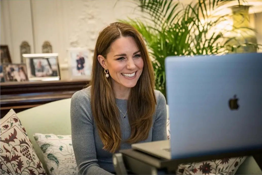 The Duchess of Cambridge wore grey Alexander McQueen knitted to for a video call to Holocaust Survivors