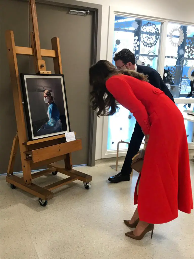 The Duchess also viewed a framed portrait of Melanie, March 2020 by Johannah Churchill, which appears on the front cover of the Hold Still book