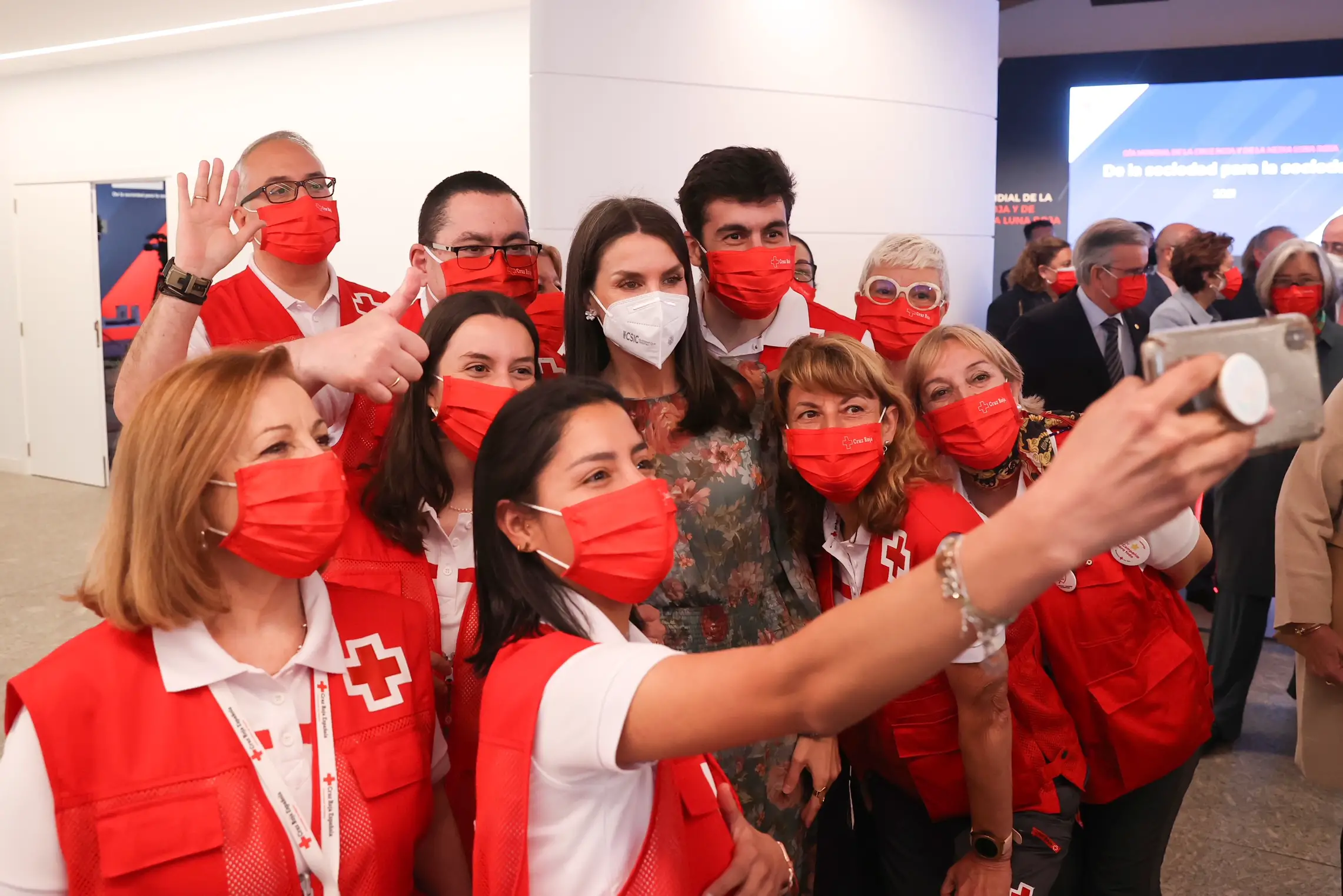 Letizia stood for a group selfie with Red Cross Volunteers
