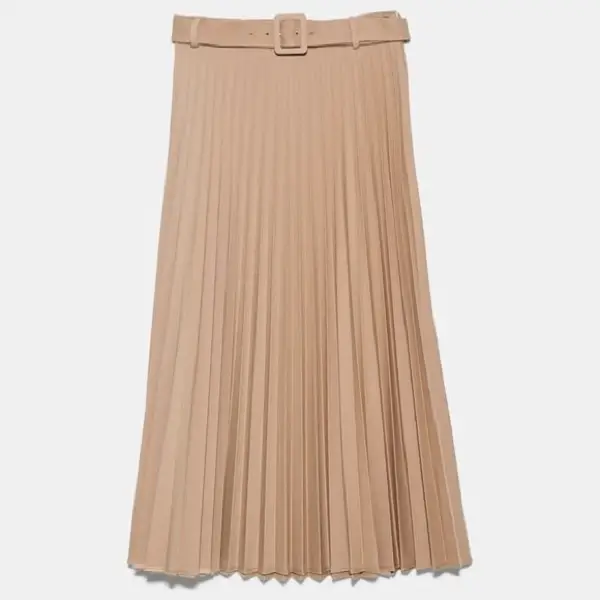 The Duchess of Cambridge was wearing Zara Camel Pleated Belted Midi Skirt in May 2021 at the launch of Hold Still book. 