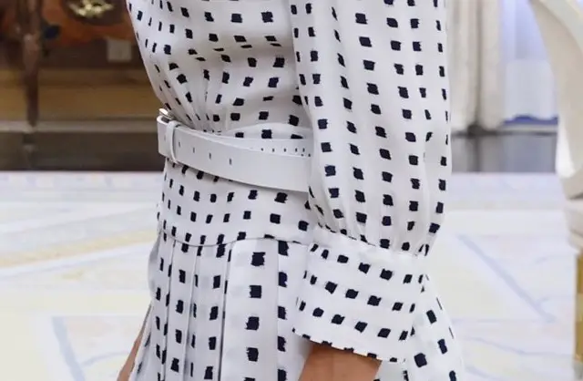 Queen Letizia of Spain in White Massimo Dutti two-tone Print dress with white belt