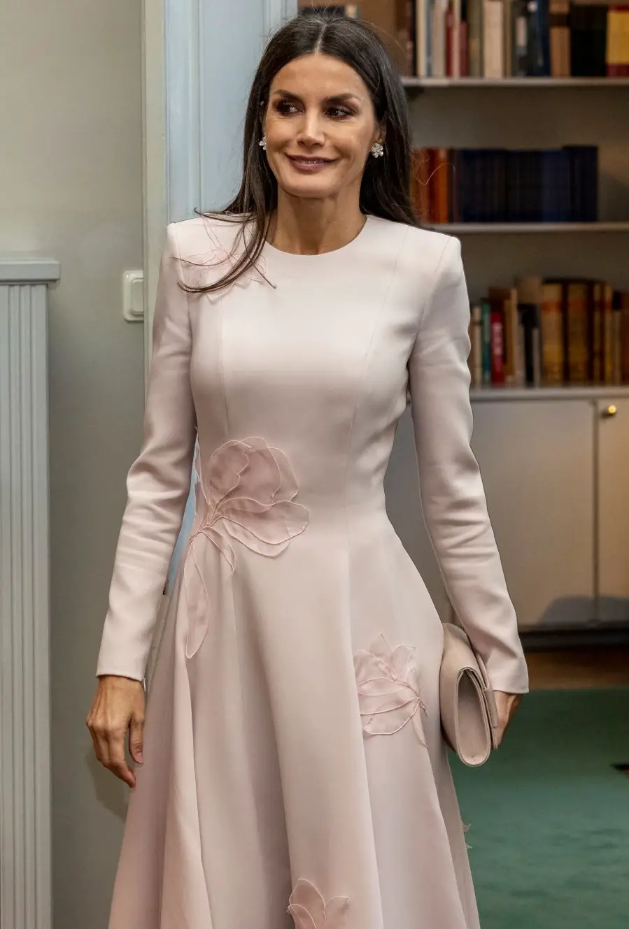 Queen Letizia chose a delicate dusty pink dress from Spanish designer Pedro Del Hierro