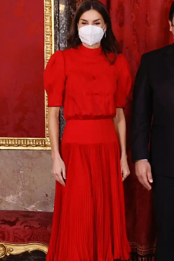 Queen Letizia wore her Mother in Law Queen Sofias red midi dress that is believed to be from 1980.